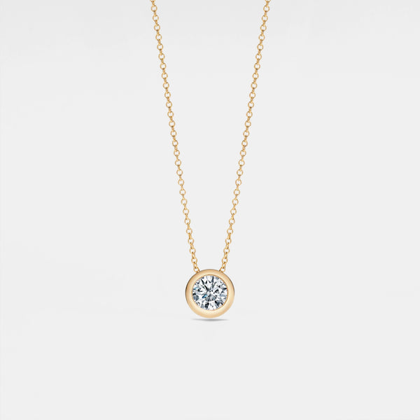 Bezel Solitaire Moissanite Necklace in Silver and Gold Plated Sterling Silver