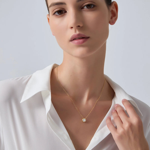 Bezel Solitaire Moissanite Necklace in Silver and Gold Plated Sterling Silver