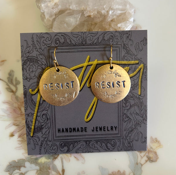 RESIST round earrings