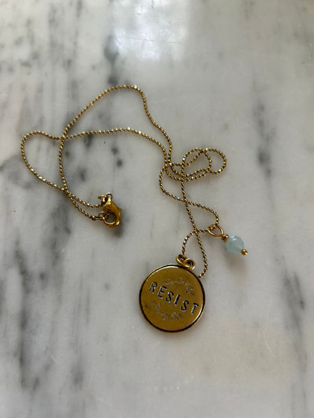 RESIST necklaces- round floral with aquamarine