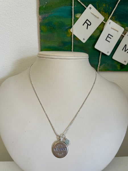 RESIST necklaces- round floral with aquamarine