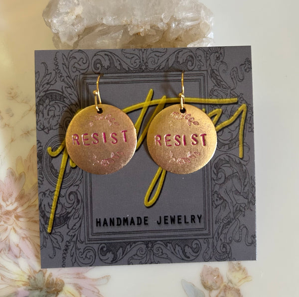 RESIST round earrings
