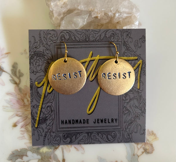 RESIST round earrings