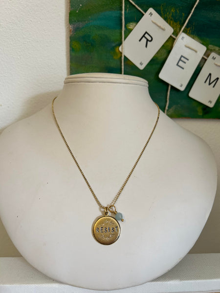 RESIST necklaces- round floral with aquamarine